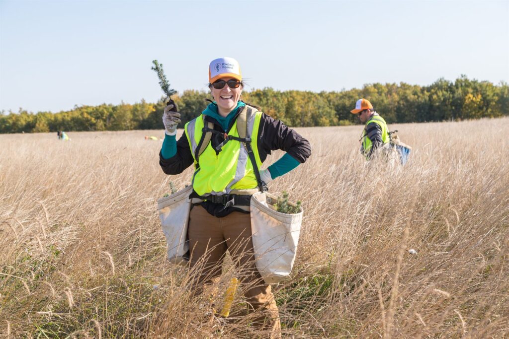 Volunteers planting in a rewilding site